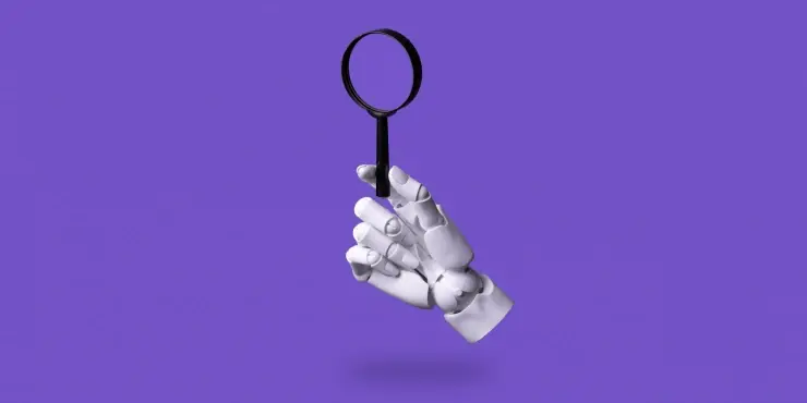 main robotique tient une loupe sur fond violet
